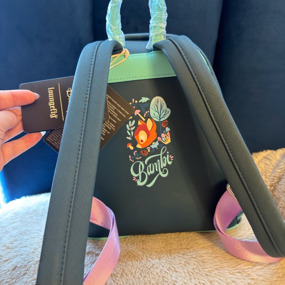 Loungefly Disney Bambi Folk Floral Green
Mini Backpack and wallet set. - Picture 4 of 7